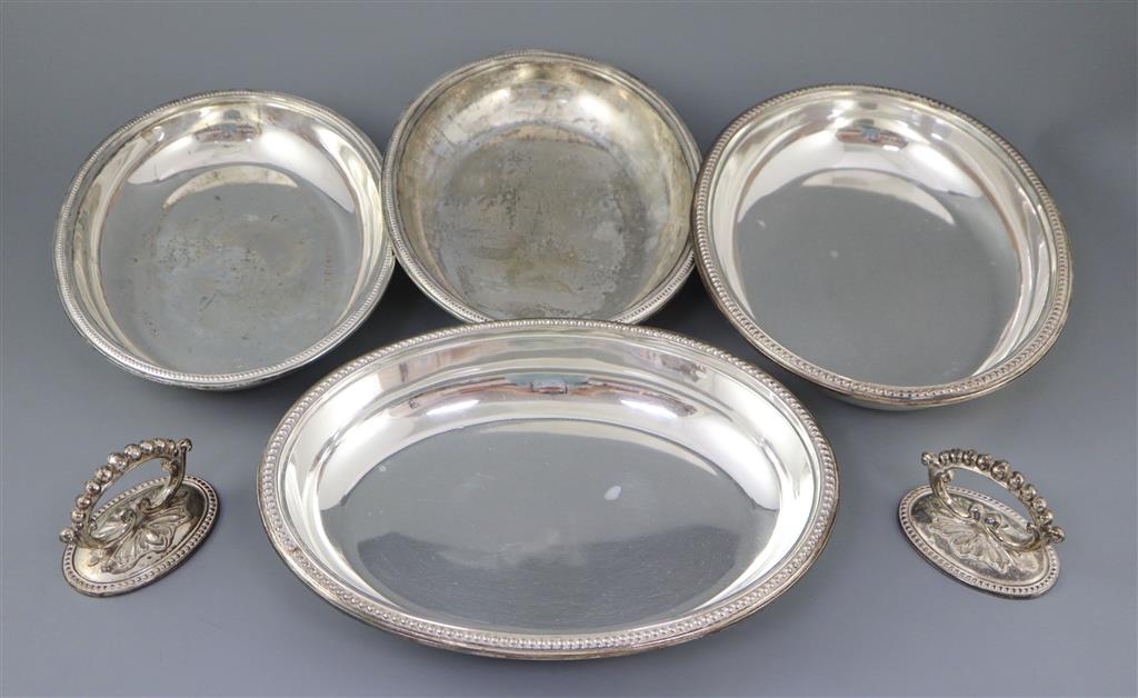 A pair of late Victorian silver oval entree dishes and covers with handles, by Mappin & Webb,